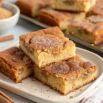 Stacked cinnamon sugar blondie bars with soft, chewy centers