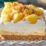 No-bake pineapple dream dessert slice with graham cracker crust