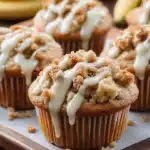 Banana muffin with cinnamon streusel and vanilla drizzle