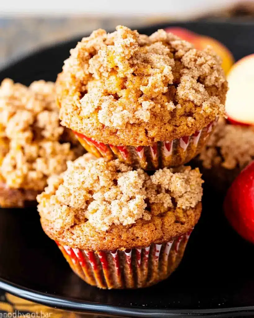 Apple pumpkin streusel muffins with buttery cinnamon crumb topping.