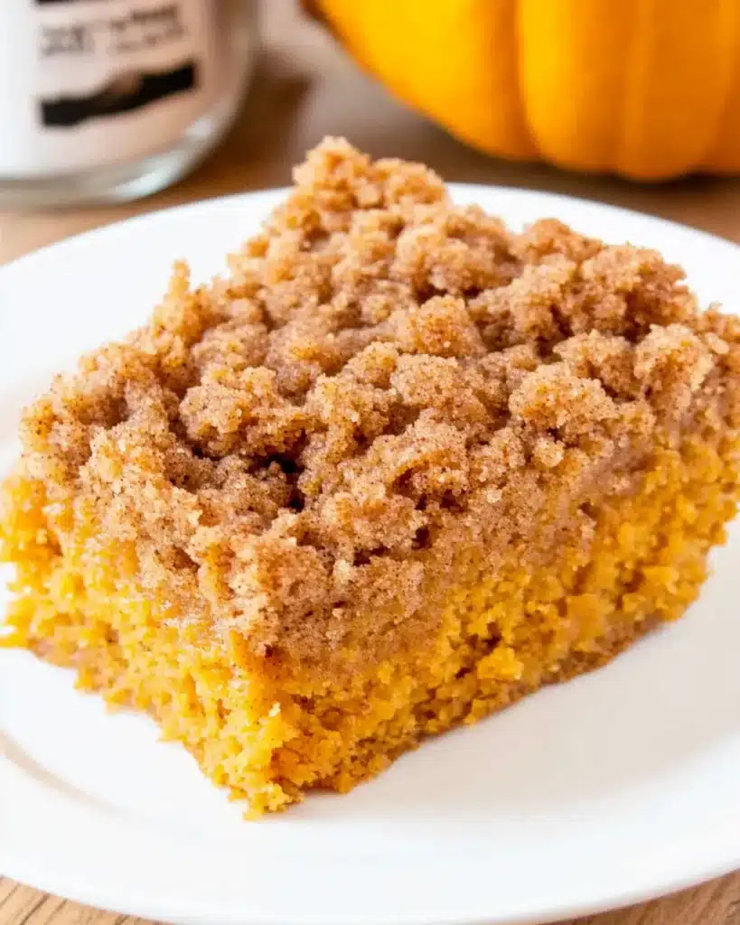 Pumpkin spice coffee cake slice with thick crumb layer
