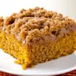 Moist pumpkin crumb cake slice with cinnamon sugar topping