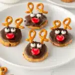Cute Reindeer Nutter Butter cookies with chocolate, pretzels, and red M&M noses