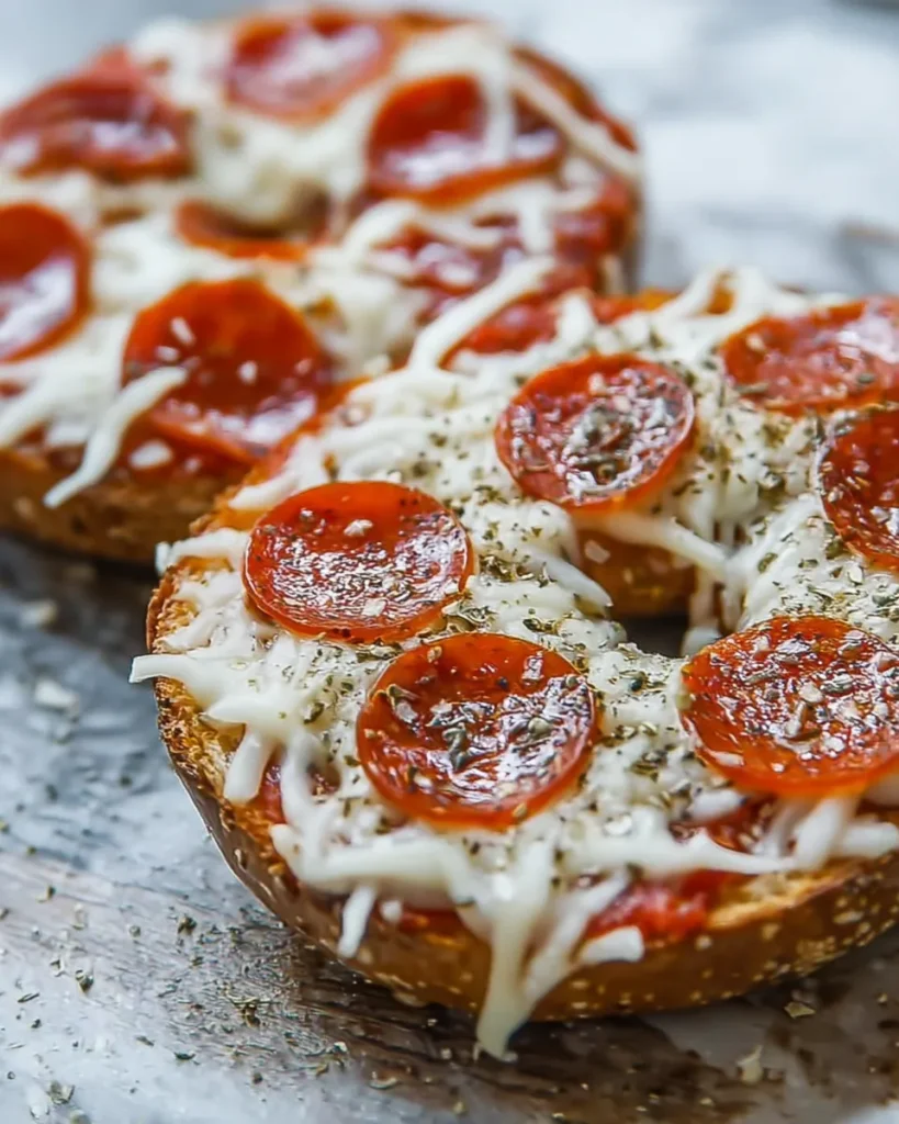 These High Protein Pizza Bagels are the ultimate low calorie pepperoni pizza snack—loaded with melted cheese on a crispy keto base.
